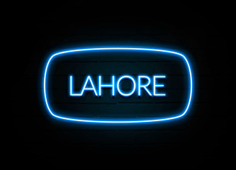 Lahore  - colorful Neon Sign on brickwall