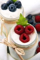 Fresh Yogurt. Breakfast with yogurt and blueberries and raspberrries