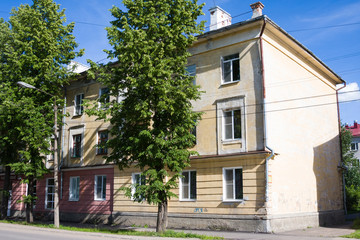 Fototapeta na wymiar Old houses at 7 Siezda Sovetov street in Kotlas, Arkangelskaya region, Russia