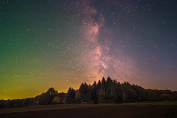 Foto op Plexiglas The Milky Way as seen from Battenberg in the Palatinate Forest in Germany. © David Hajnal