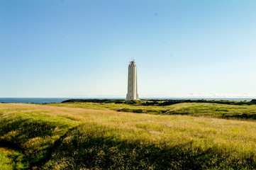 Fototapeta na wymiar Lighthouse on the coast in Iceland