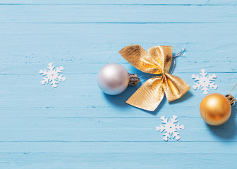 Christmas decorations on blue wooden background