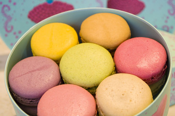 french colorful macaroons in a gift box