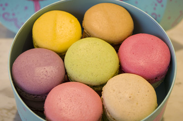french colorful macaroons in a gift box