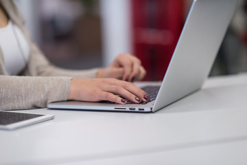 businesswoman using a laptop in startup office