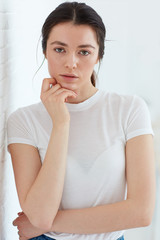 Fototapeta premium young attractive girl posing on model test shoot with natural day light
