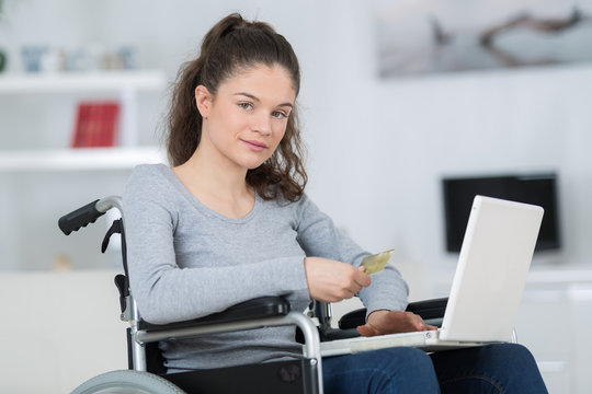 Young Disabled Girl Using Laptop