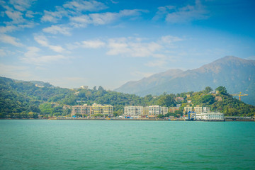 Fototapeta premium Beautiful view of mui wo town in the horizon at rural town, located in hong kong lantau island