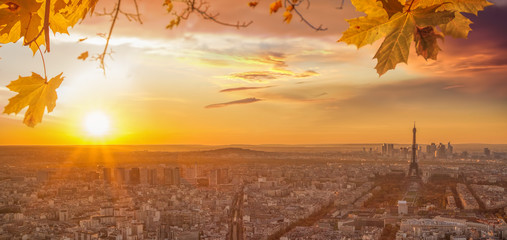 Paris with Eiffel Tower against colorful sunset in France