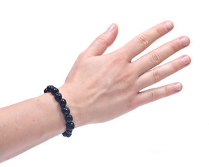Black Tourmaline Bracelet on woman's wrist isolated on white background