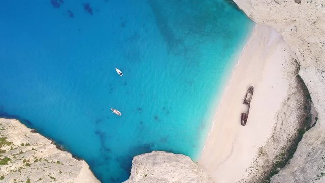 Picturesque aerial view of greek Mediterranean islands with their blue waters, beaches and cliffs