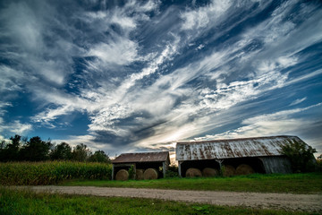 Fototapeta na wymiar Incredible Sky Rural Michigan Hay Barn Farm Vibrant