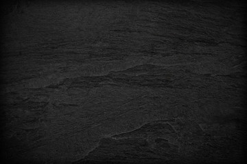 Dark grey black slate background or texture.