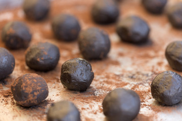 Pure cocoa truffles in a horizontal shot