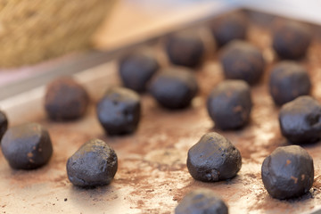 Obraz na płótnie Canvas Pure cocoa truffles in a horizontal shot
