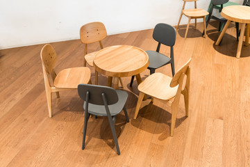 Modern wooden table and chair on wooden floor at kid corner