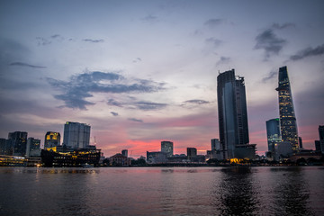 Fototapeta premium Sunset over Downtown Saigon, Ho Chi Minh city, Viet Nam. Ho Chi Minh city is the biggest city of Vietnam and is the economic center of the country