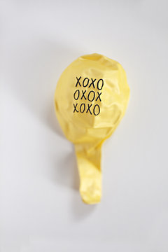 XOXO Handwritten message on a balloon ready to be inflated