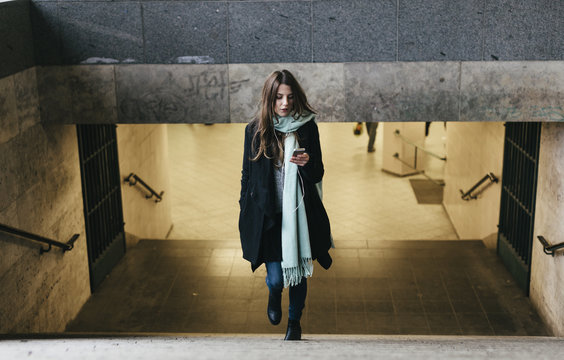 Woman leaving Subway Station