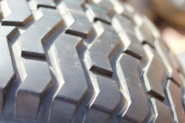 Close up on car tire abstract automotive transportation background