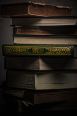 Fototapeta na wymiar Koran - holy book of Muslims ( public item of all muslims ) on the table , still life