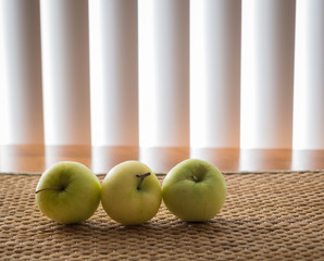 Three green apples