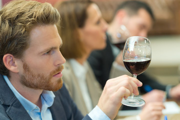 man tasting wine