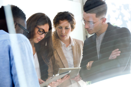Group of business people working in modern office.