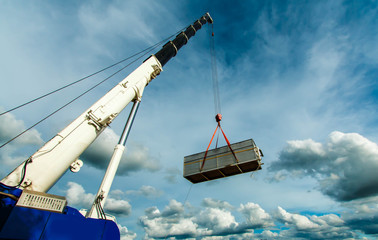 Truck and Crane in site for construction and blue sky 