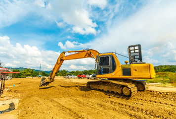 Obraz premium excavator at sandpit during earthmoving works