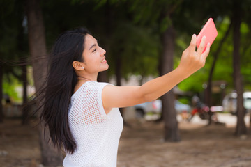 Naklejka premium Beautiful Asian woman vacation on beach of Thailand