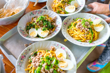 Yunnan Noodle , Kwa Meng spicy noodle soup with vegetables, herbs, peanuts and coriander, is popular noodle food of China