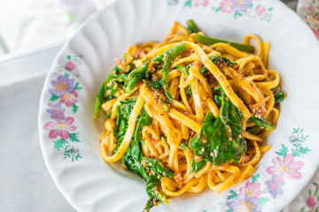 Yunnan Noodle , Kwa Meng spicy noodle soup with vegetables, herbs, peanuts and coriander, is popular noodle food of China