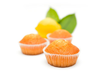 Lemon muffins on white background