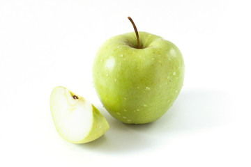 One single green apple with slice apple on white background autumn style season concept organic food