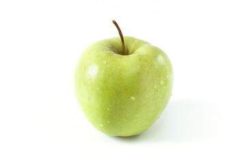 One single green apple on white background autumn style season concept organic food isolated