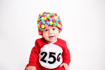 Adorable baby wearing gum ball machine Halloween costume