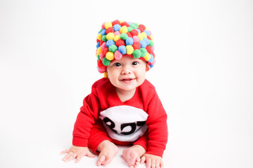 Adorable baby wearing gum ball machine Halloween costume