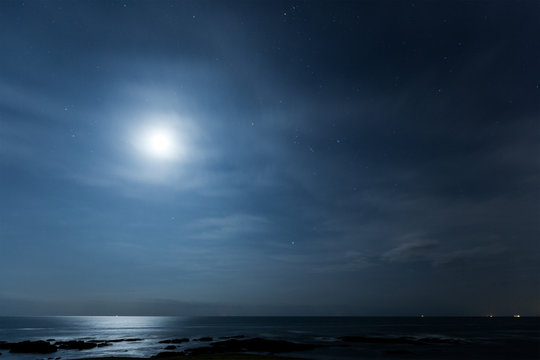 Moon and seascape at night