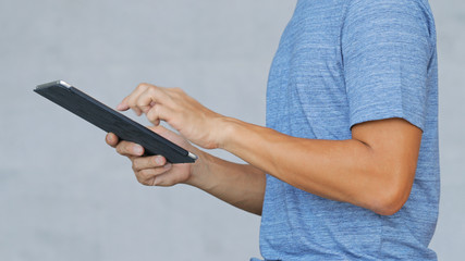 Young man using tablet computer