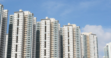 Fototapeta na wymiar Hong Kong residential building with blue sky