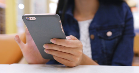 Use of mobile phone in cafe