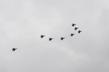 combat aircraft on cloudy sky