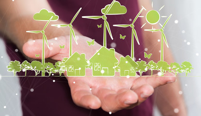 Businessman holding renewable energy sketch