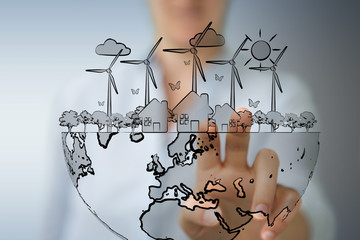 Businesswoman touching and holding renewable energy sketch
