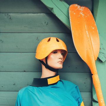 Mannequin with kayaking equipment