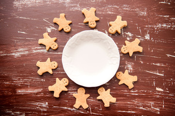 Christmas food. Gingerbread man cookies in Christmas setting. Xmas dessert