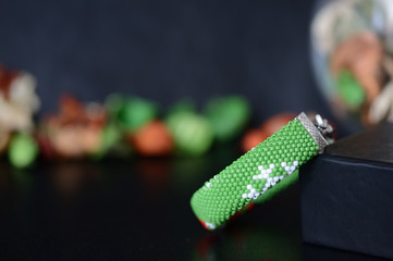 Green Christmas bracelet with image of Santa close up