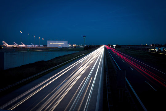 Autobahn, nachts, Lichtzieher