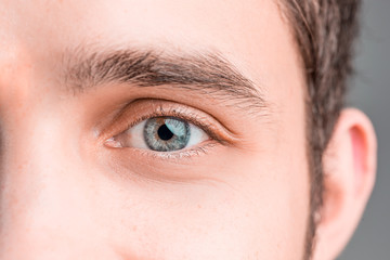 The conceptual image of digital eye of a young man and eoman